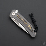 Turaco | TechnoCarbo Gold + Mirror Polished M390