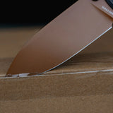 Raccoon TiSlim™ | Black Ti + Copper Dune 154CM